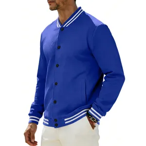 Detail view of mens royal blue varsity jacket with white striped cuffs and snap buttons.