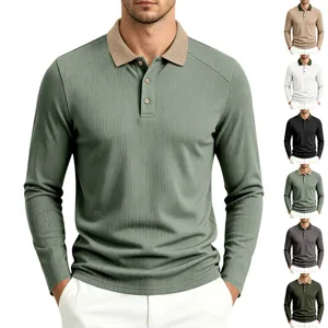 Details of men's long sleeve polo shirt with contrast knit collar and button placket.