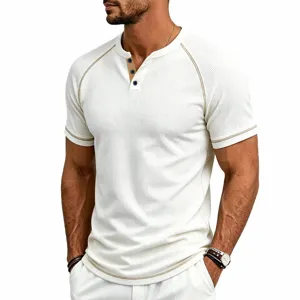 Close-up of men's waffle knit short sleeve Henley shirt with contrast stitching and buttons.