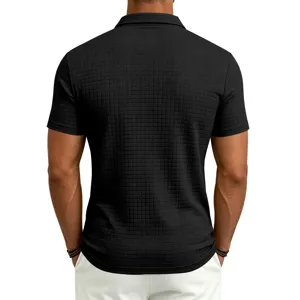 Back detail view of a black textured waffle grid short-sleeve polo shirt for men.