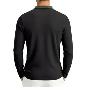 Back view of men's long sleeve polo shirt, black knit top with contrast green collar detail.