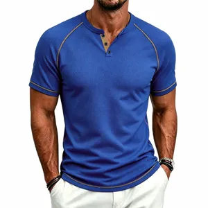 Detail shot of men waffle knit henley t-shirt, short sleeve contrast stitching design.