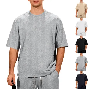 Men's casual oversized jacquard knit short sleeve t-shirt and shorts set for summer.