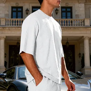 Men's white oversized knit short sleeve t-shirt and shorts set, casual jacquard top.