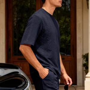 Men's navy blue jacquard knit short sleeve t-shirt, high street casual style detail.