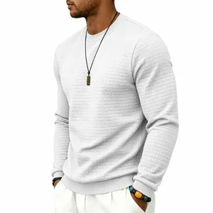 Detailed shot of men waffle knit crewneck long sleeve t-shirt in white, casual textured fabric.
