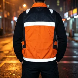 Detail rear shot of the high-visibility tactical safety vest with reflective strips.
