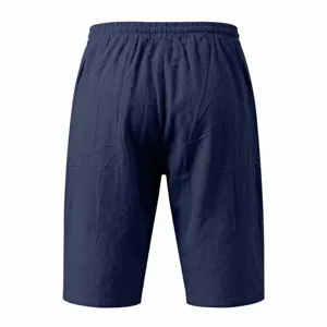 Detailed view of men's casual solid color navy blue drawstring elastic waist shorts.