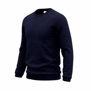 Dark blue waffle knit long sleeve sweatshirt close-up showing textured fabric details.