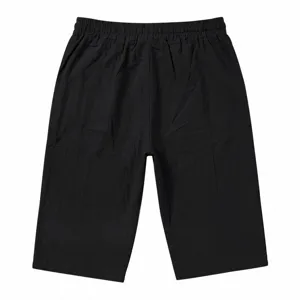 Detailed view of men's casual black solid color summer capri shorts with elastic waistband.