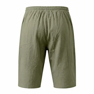 Detailed view of casual men's green cotton linen shorts back design elastic drawstring waist