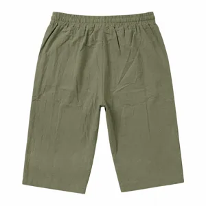 Detail view of men's olive green casual drawstring capri shorts back elastic waistband.