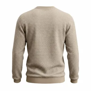 Detailed view of the waffle knit texture on the back of the solid color men's sweater.