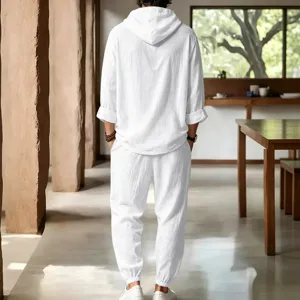 Back view of men's white casual linen hooded outfit showing loose fit design and breathable fabric.