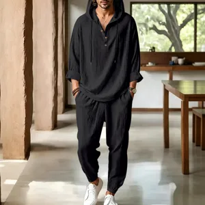 Detailed shot of mens black linen hooded two piece set showing breathable fabric and casual fit.