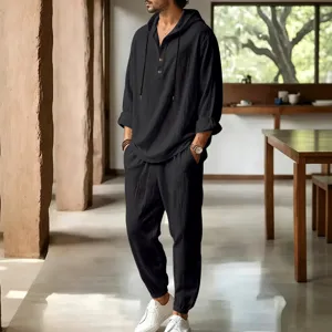 Detail view of men's casual black linen hooded top and trousers set for summer leisure wear.