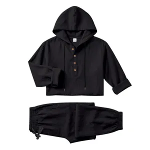Details of the black linen hooded henley shirt and matching pants, lightweight breathable fabric.