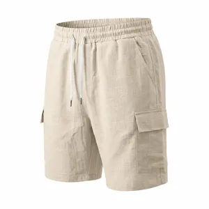 Pantalones cortos cargo informales beige para hombre con cintura elástica y bolsillos.