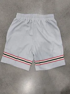 Men grey waffle knit shorts casual sports shorts with contrasting striped hem design.