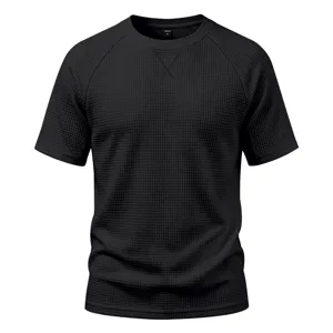 Close-up detail of black waffle knit fabric, short sleeve men t-shirt collar design.