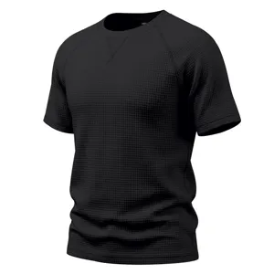 Detail view of men's black waffle knit short sleeve t-shirt, casual breathable crew neck top.