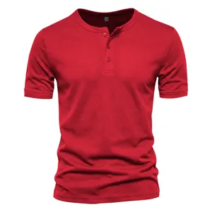 Red men short sleeve Henley shirt close-up showing breathable mesh fabric and button placket.
