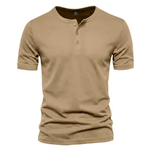 Men's khaki short sleeve Henley shirt, casual slim fit textured cotton t-shirt top.