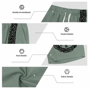 Men's linen-feel Viking tree print shorts detail showing elastic waistband pocket and fabric.