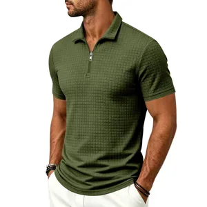 Textured grid polo shirt detail showcasing the stylish half-zipper collar and olive green fabric.