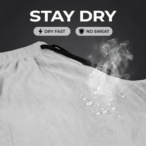 Men quick dry breathable athletic pants detail showing moisture wicking fabric performance.
