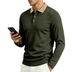 Detailed view of men's long sleeve knit polo shirt in dark green with contrast collar.