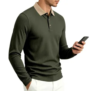 Close-up detail of mens long sleeve polo shirt in dark green with contrast beige collar.
