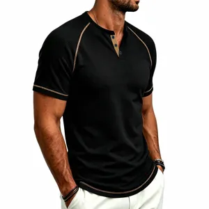 Men's black waffle knit short sleeve Henley t-shirt detail showing contrast stitching and buttons