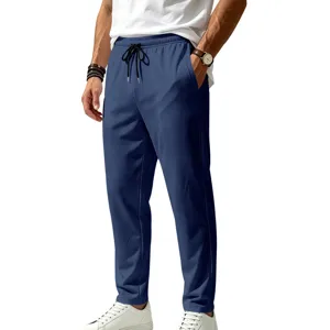 Close-up detail of mens breathable quick-dry casual pants with elastic drawstring waist.