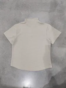 Men casual waffle grid textured short sleeve polo shirt detail view, beige summer top.