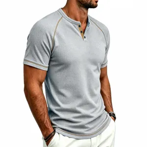 Detail view of men's grey waffle knit henley t-shirt with raglan sleeves and contrast buttons.