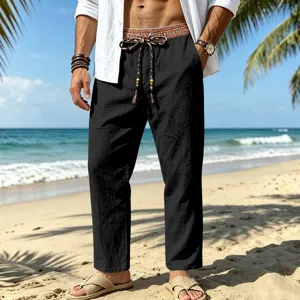 Men loose linen beach trousers with ethnic waistband and straight fit for casual vacation.