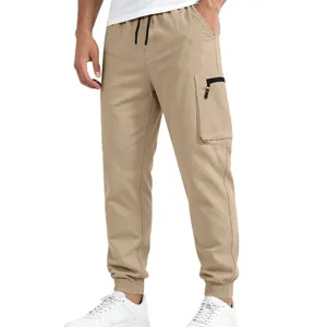 Men's casual cargo pants detail view showcasing elastic cuffed hem, secure zippered side pocket.