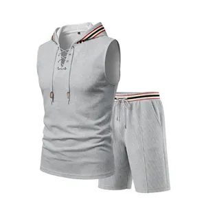 Grey sleeveless hoodie and shorts set detail, textured fabric with striped trim and drawstrings.