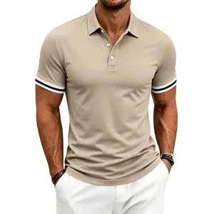 Close-up detail shot of mens casual polo shirt showing contrast striped cuffs and collar.