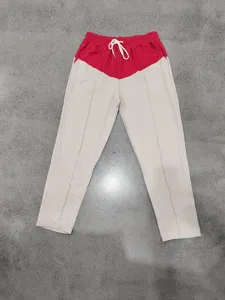 Detail view of American style contrast color casual straight pants with white drawstring.
