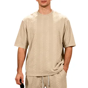 Close-up details of the men's casual high street oversized jacquard knit short sleeve t-shirt.