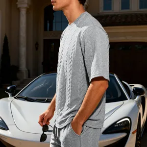 Men grey cable knit short sleeve t-shirt detail, luxury casual summer streetwear outfit.
