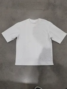 Men's casual oversized jacquard knit crewneck short sleeve t-shirt in solid white style.