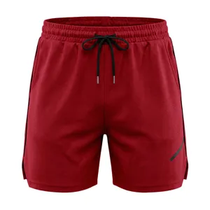 Red mesh athletic shorts, breathable quick-dry fabric with black drawstring waistband.