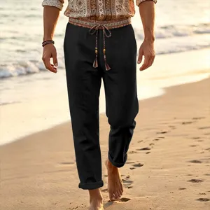 Men casual linen beach pants with ethnic print waistband and loose straight fit design style.