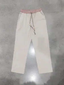 Men casual linen trousers detail view with ethnic waist drawstring straight long pants.