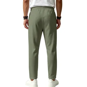 Back view details of men's casual solid color sports jogger pants with elastic waist.
