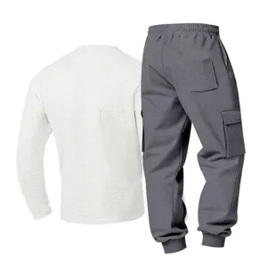 Detail view of men's casual waffle long sleeve top and grey cargo sweatpants set.