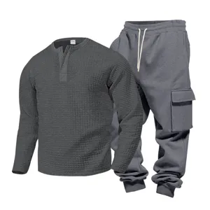 Men grey waffle Henley long sleeve shirt and cargo sweatpants casual tracksuit outfit for men.
